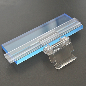 PROFILE WITH ADHESIVE FILM, 1800 MM LENGTH, FIXING BY BONDING ABOVE OR UNDER THE SHELF